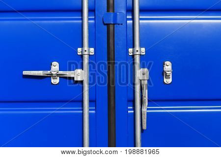 Steel locks of cargo container closeup. Container locks close-up.
