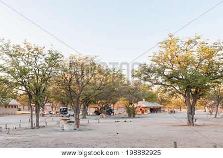 ETOSHA NATIONAL PARK NAMIBIA - JUNE 22 2017: A view of camping sites at the Halali Rest Camp in the Etosha National Park Namibia