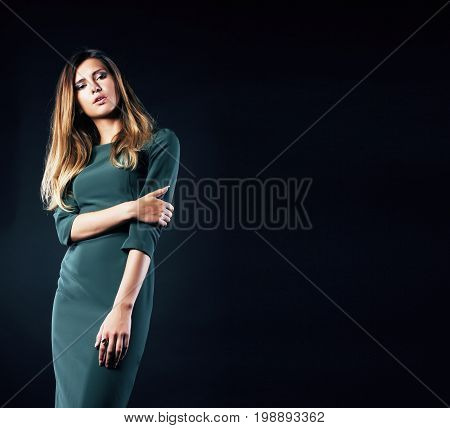 young blond real woman emotional in depression dark indoor, beautiful sadness