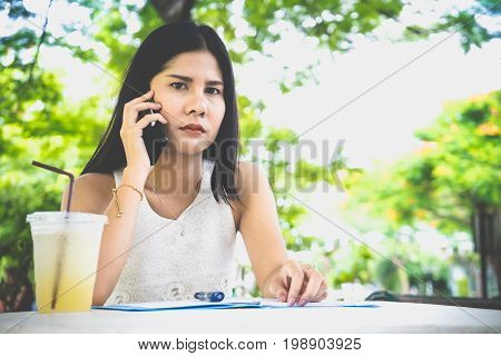 Girl Listening To Conversation Pretty Serious. Having Angry Look, Receiving Negative News While Talk