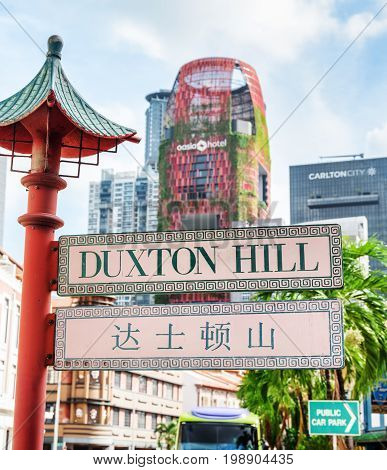Scenic Bilingual Street Sign At Duxton Hill In Singapore
