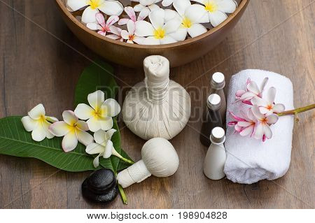 Spa massage compress balls herbal ball on the wooden with treaments spa Thailand select focus