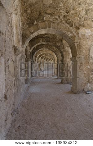 Internal passages in the ancient Roman amphitheater of Aspendos. The province of Antalya. Mediterranean coast of Turkey.