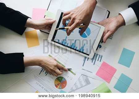 Business Team Hands At Working With Financial Plan, Meeting, Discussion, Brainstrom With Tablet On O