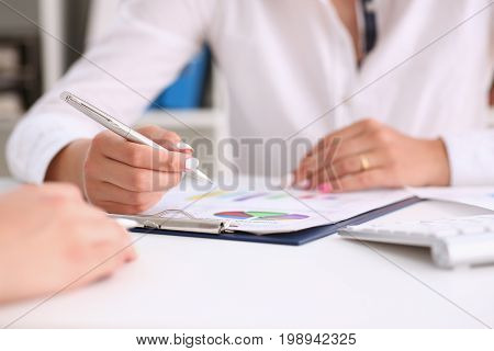 Businesswoman Holding A Silver Pen In Her Hand