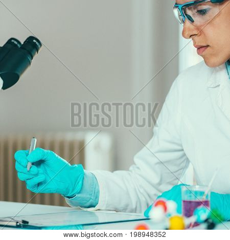 Scientist Researching In Laboratory, Toned Image, Selective Focus