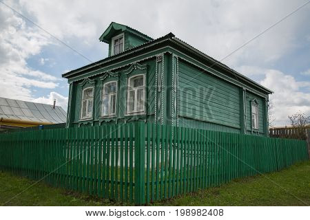 Russian rural wooden vintage house counryside low angle shot