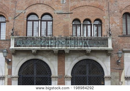 LUCCA, ITALY - AUGUST 15 2015: Historic facade of Banca Commerciale Italiana in Lucca city center Italy (Italian commercial bank)