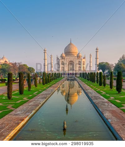 Agra, India - March 5 2018: Tourists Sighteseeing, Exploring And Admiring Famous The Taj Mahal