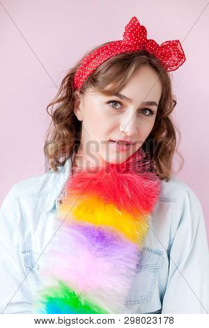 Cleaning Pin Up Woman. Smiling Pinup Girl Holds Colorful Duster Brush. Cleaning Service. Pin-up Girl