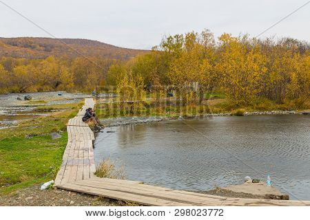 Malkinskiye Hot Springs, Malka, Russia- 27 September 2014: People In A Hot Springs In The Center Kam