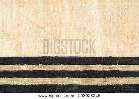 Authentic Egypt Papyrus Paper Background With Horizontal Black And Gold Lines. Close Up Macro Textur