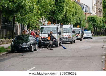 Strasbourg, France - Apr 28, 2019: City Services Cleaning The Allee De La Robertsau From Teargas Was
