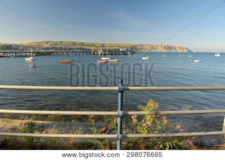 The Seafront At Swanage On The Dorset Coast Looking Across The Bay From Peveril Point