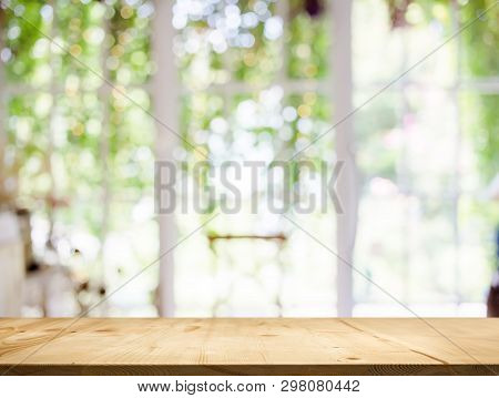 Wood Table Top White Garden Bokeh Background.