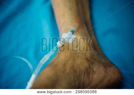 Patient With Saline Intravenous In The Hospital