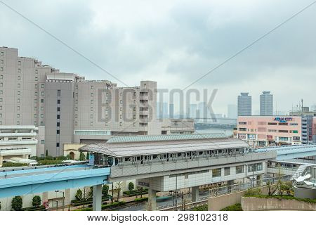 Odaiba, Japan - 11 April 2019 - Odaiba Monorail Trains Stop At A Station To Send And Pick Up Passeng