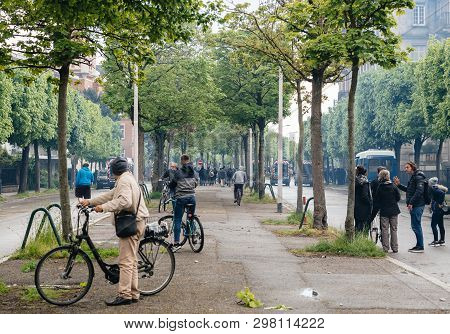 Strasbourg, France - Apr 28, 2019: Rear View Of Pedestrians Looking At Police Gendarmerie Securing A