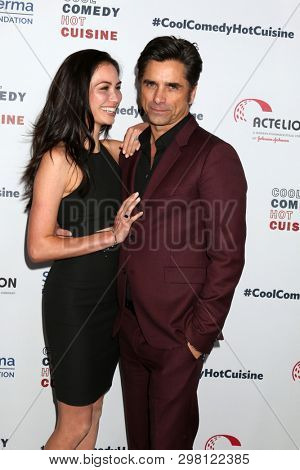 LOS ANGELES - APR 25:  Caitlin McHugh, John Stamos at the Cool Comedy, Hot Cuisine 2019 at the Beverly Wilshire Hotel on April 25, 2019 in Beverly Hills, CA