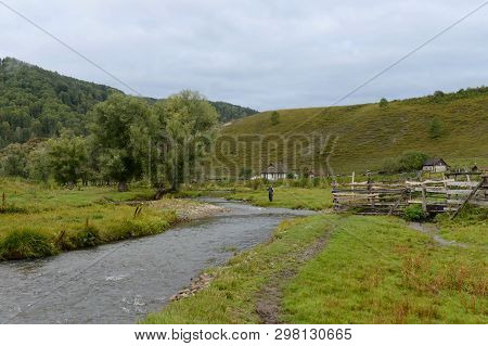 The Mountain River Yarovka In The Taiga Settlement Of Generalka Of The Altai Territory