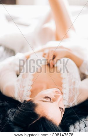 Boudoir Portrait Of Beautiful Bride. Bride Wedding Morning.