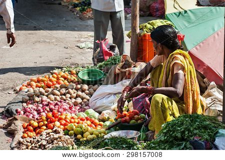 The Colorful Of Fresh Open Air Gulmandi Local Market. Woman Selling Vergetables On Street Side Walk.