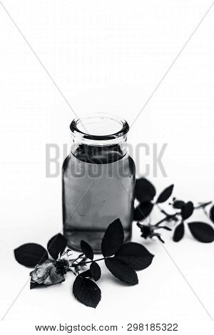Rose Water Or Rosa Water Isolated Also Known As Gulab Jal Or Gulab Ka Pani Isolated On White.