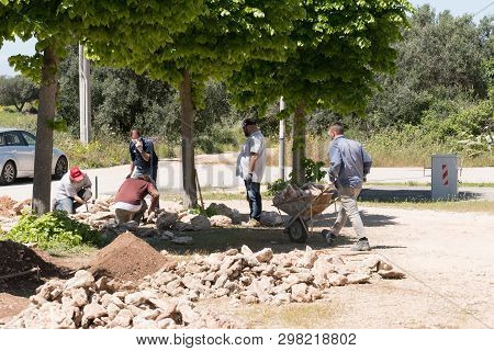 Maruggio, Italy - April 28, 2019 - Construction Of A Low Wall - Old Traditional Apulian Architectura