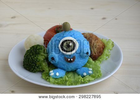 The Monster Is Made Of Rice. Kyaraben, Bento. Creative Food For Good Mood And Appetite.