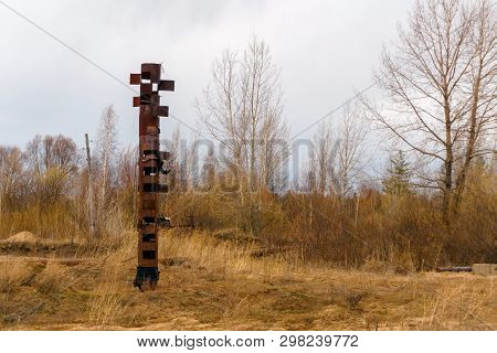 Strange Rusty Pipe Sticks Out In The Middle Of A Wasteland, Resembling A Totem Pole
