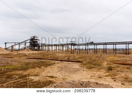 Desert Industrial Landscape With Stationary Rusty Gravitational Separator Of Sand And Gravel On The 
