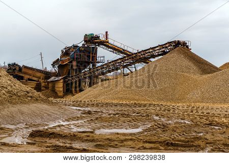 Desert Industrial Landscape With Stationary Rusty Gravitational Separator Of Sand And Gravel On The 