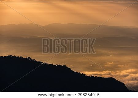 Beautiful Mountain And Morning Sunrise Over The Sea Of Mist. Mon Sone View Point , Doi Pha Hom Pok N