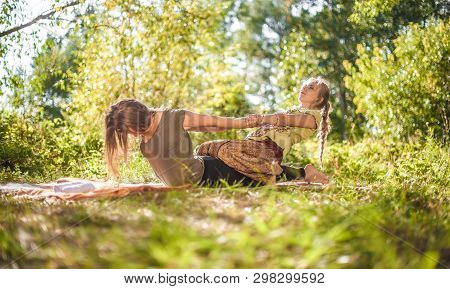 Massage Trainer Thuroughly Massages A Girl Outside.