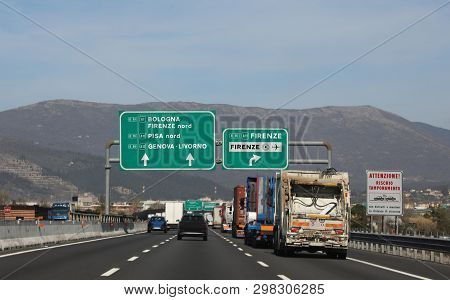 Big Road Signs In Tuscany Near Florence In Italy And Many Trucks