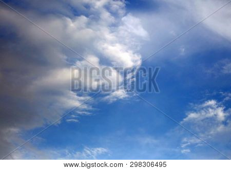 Background Of Blue Sky With White Clouds And
