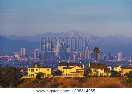 Luxury Villas Of Los Angeles In California With City Skyline In The Background Photographed From Ken
