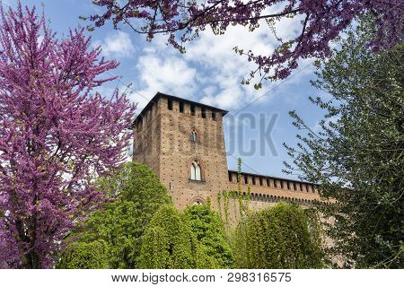 Pavia, Lombardy, Italy: The Medieval Castle Known As Castello Visconteo At Springtime (april) With F