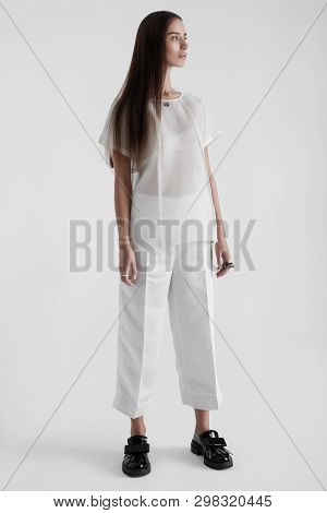 Sensual Brunette In Vogue Outfit