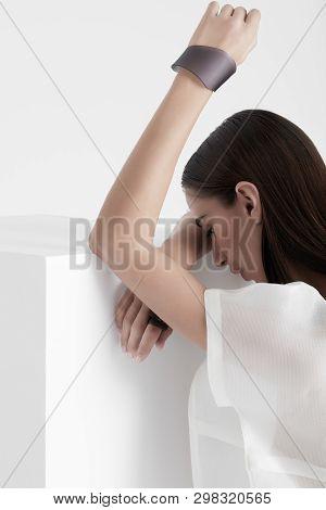 Contemporary Model In Simple Outfit On White
