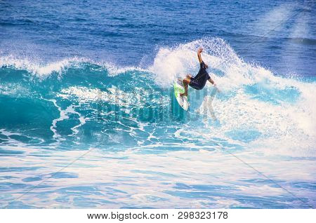 Hossegor, France - February Circa , 2019. An Unidentified Surfer Man Catching Riding On An Ocean Wav