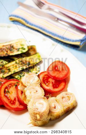 Spiedini Of Pork Meat And Cheese On Skewer