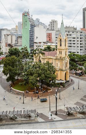 Sao Paulo Sp, Brazil - February 27, 2019: Downtown Square Called Largo Do Paissandu With The Igreja 