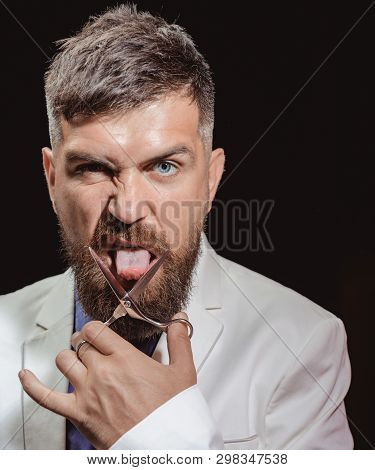 Talker. Blogger. Say Too Much. A Man Tries To Cut His Tongue With Scissors. Bearded Guy Holds Sharp 