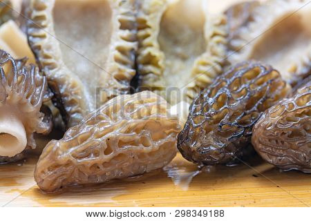 Fresh Morchella Esculenta On Cutting Board. Closeup Photo With Selective Focus.