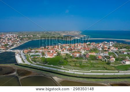 Aerial View Of City Of Nin. Summer Time In Dalmatia Region Of Croatia. Coastline And Turquoise Water