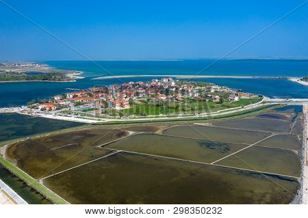 Aerial View Of City Of Nin. Summer Time In Dalmatia Region Of Croatia. Coastline And Turquoise Water