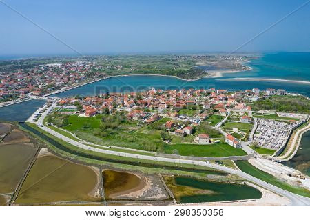 Aerial View Of City Of Nin. Summer Time In Dalmatia Region Of Croatia. Coastline And Turquoise Water