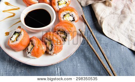 Salmon Sushi Set On The Plate With Soe Sauce. Top View