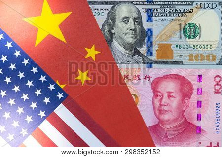Us Dollar And Yuan Banknote On Usa And China Flags. Its Is Symbol For Tariff Trade War Crisis Betwee
